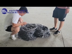 Low-Visibility Wire Obstacle  Battlefield defense tank advancing across iron wire mesh